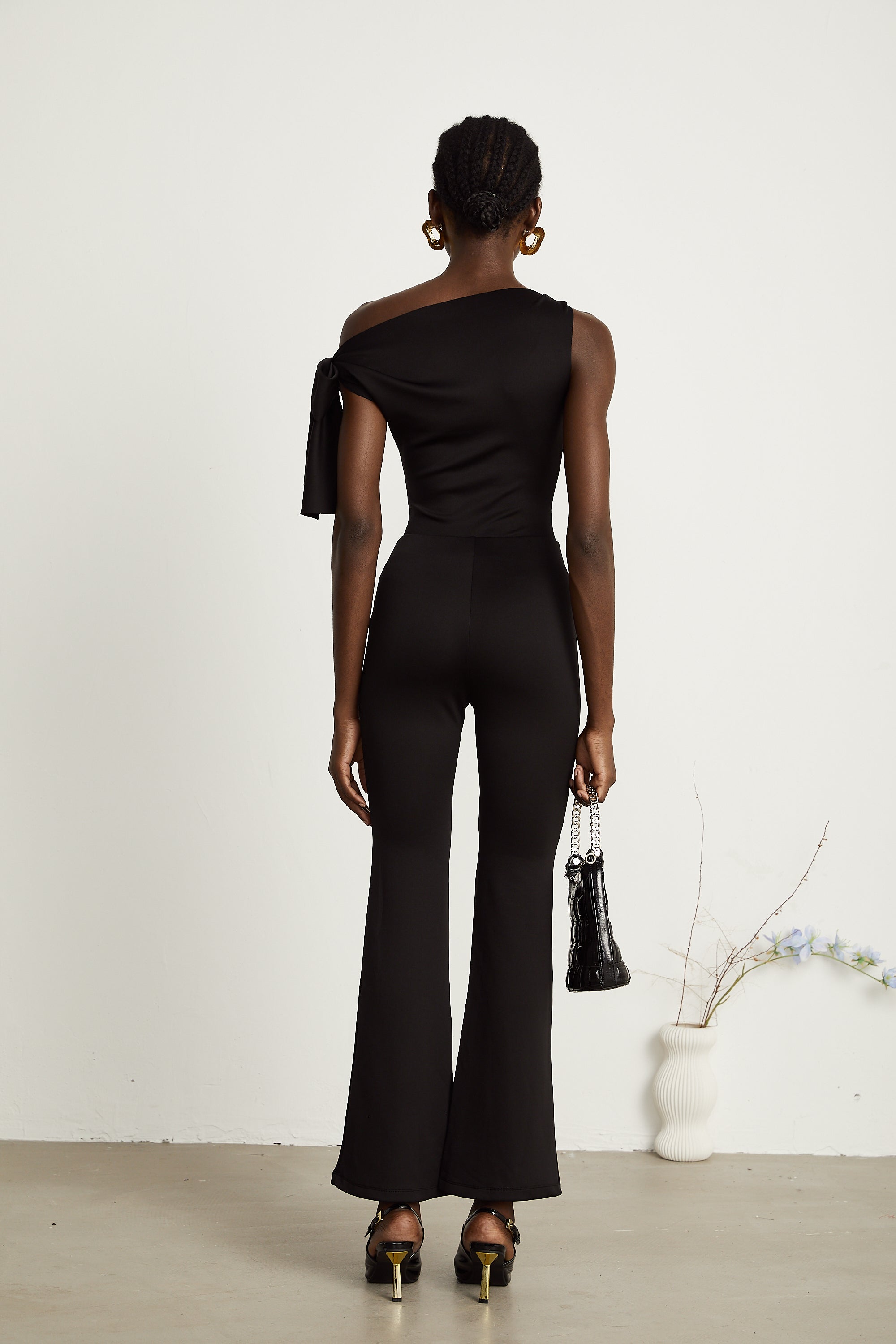 Ensemble coordonné Clotilde : haut et pantalon en maille noire (Vente définitive - États-Unis uniquement)
