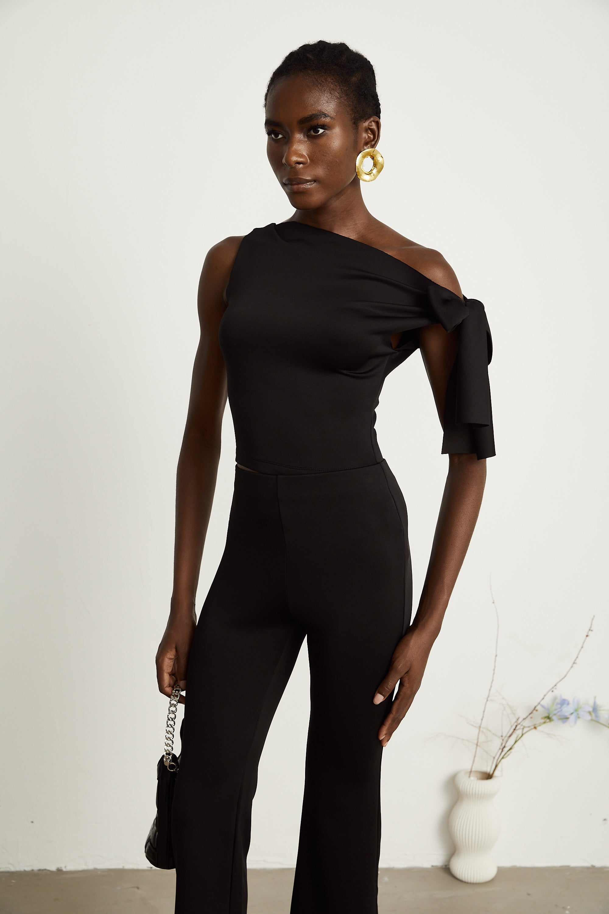 Ensemble coordonné Clotilde : haut et pantalon en maille noire (Vente définitive - États-Unis uniquement)
