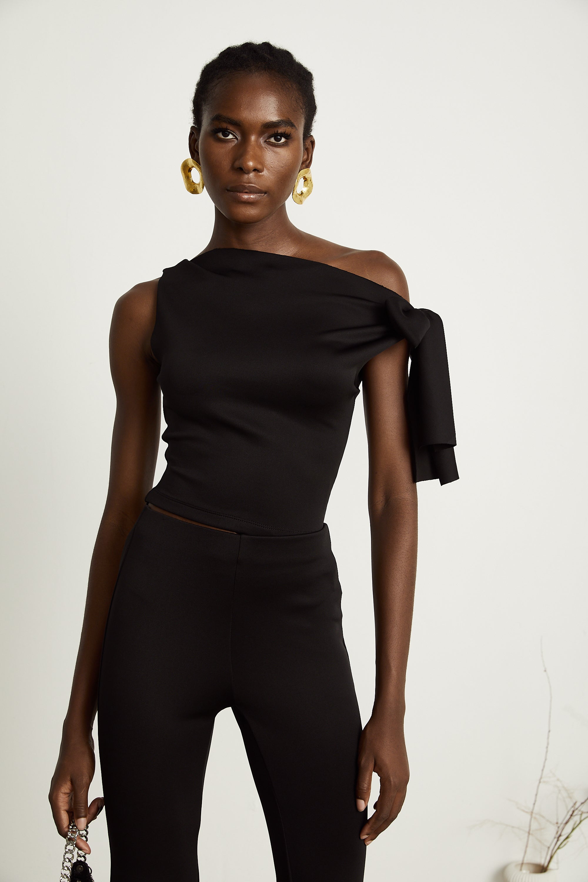 Ensemble coordonné Clotilde : haut et pantalon en maille noire (Vente définitive - États-Unis uniquement)