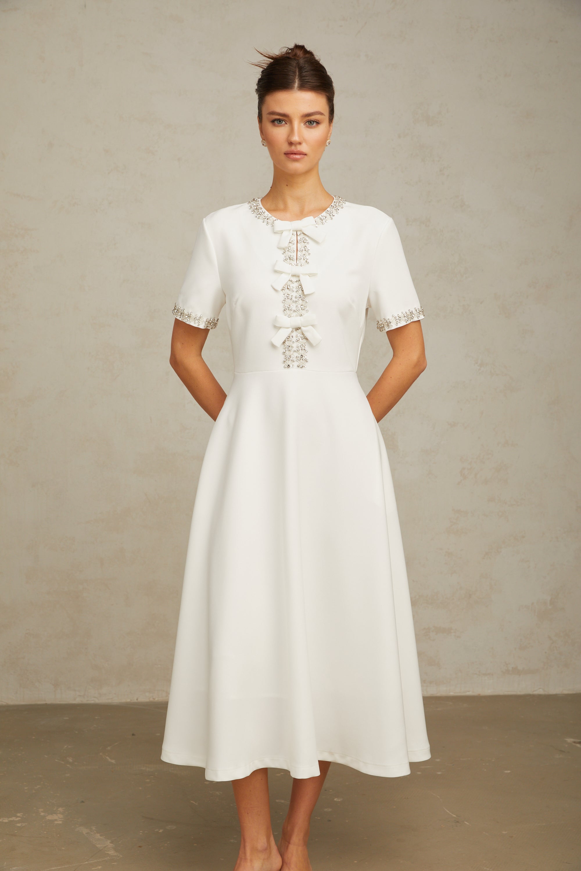 Cassiopeia crystal-accented bow midi dress in White (Final Sale)