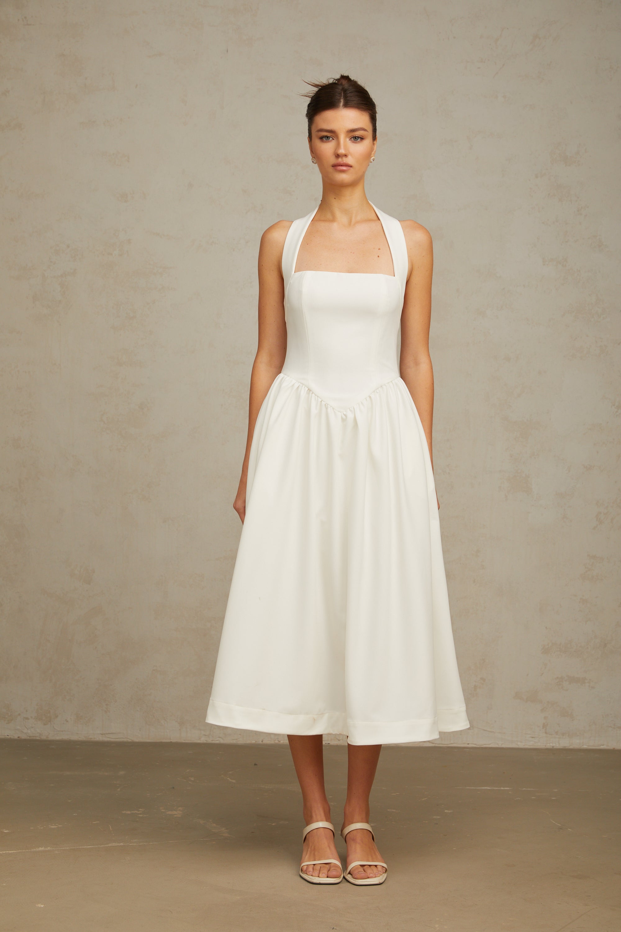 Alizée halterneck pleated midi dress in White (Final Sale)