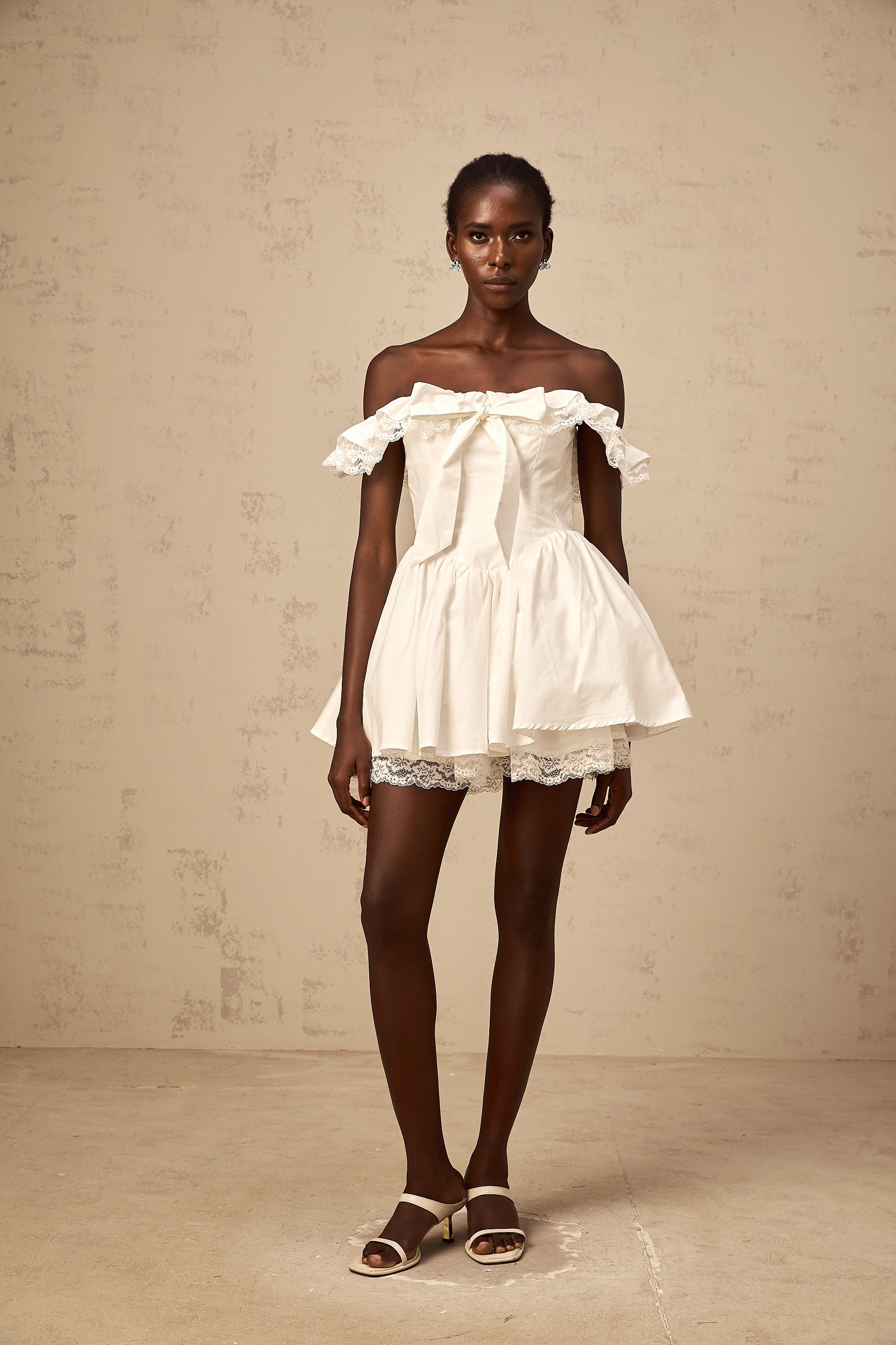 Arsène white oversize-bow ruffled mini dress (Final Sale)