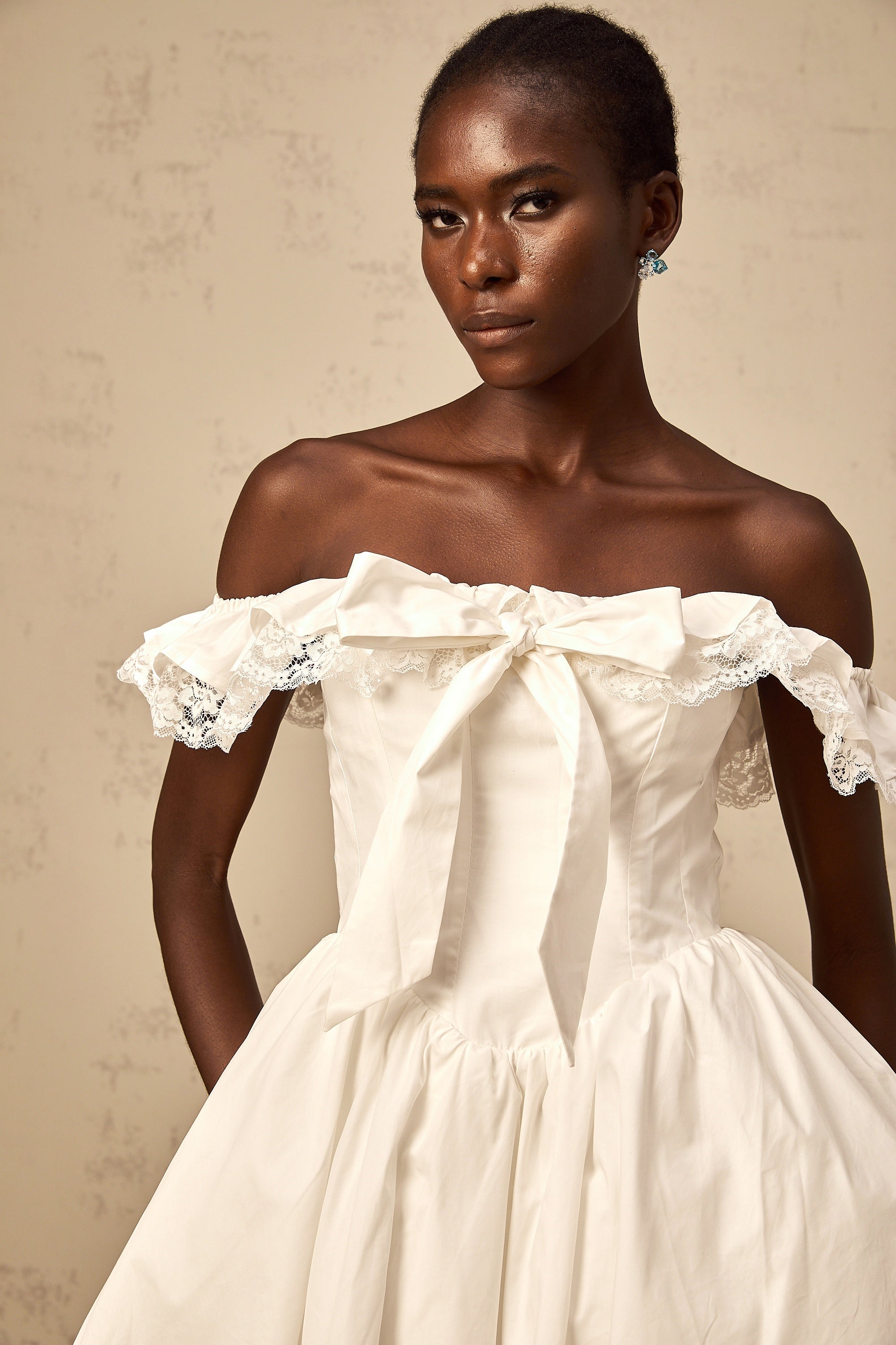 Arsène white oversize-bow ruffled mini dress (Final Sale)