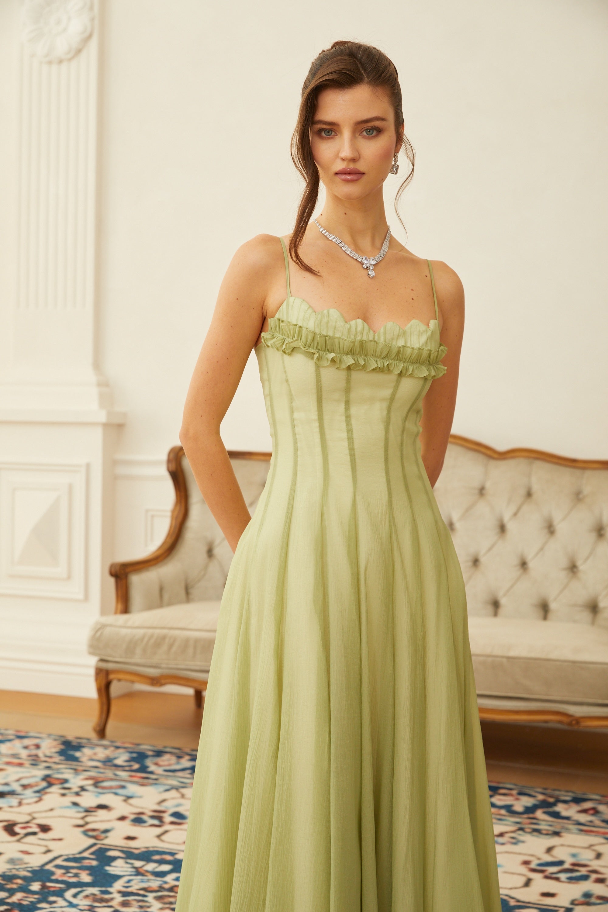 Light green spaghetti strap maxi dress with a ruffled neckline