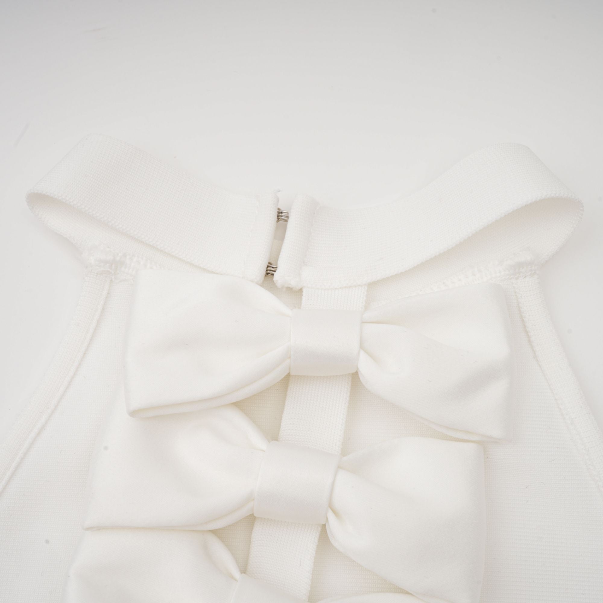 Capucine white oversize-bow bandage dress (Final Sale)