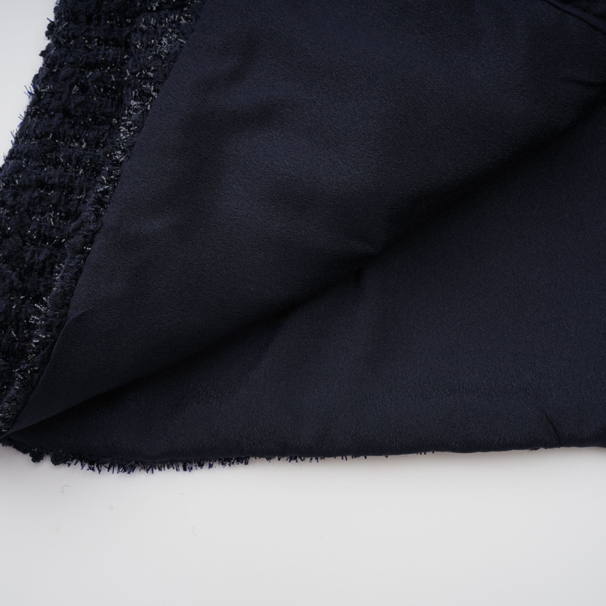 Navy blue short-sleeve maxi dress with a peplum jacket bodice and satin skirt