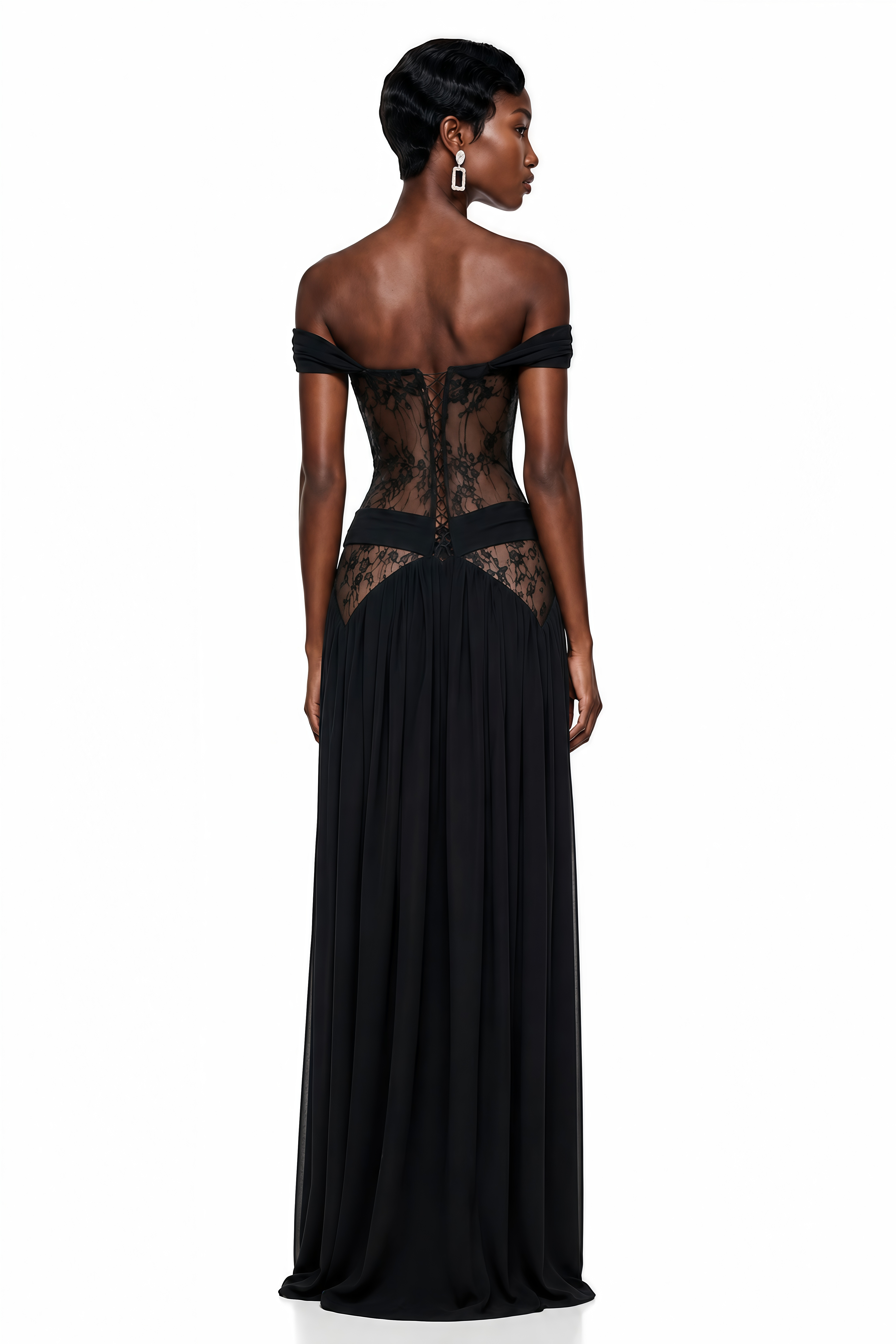 Black off-the-shoulder maxi dress with a draped neckline, crisscross sheer lace bodice, and high leg slit