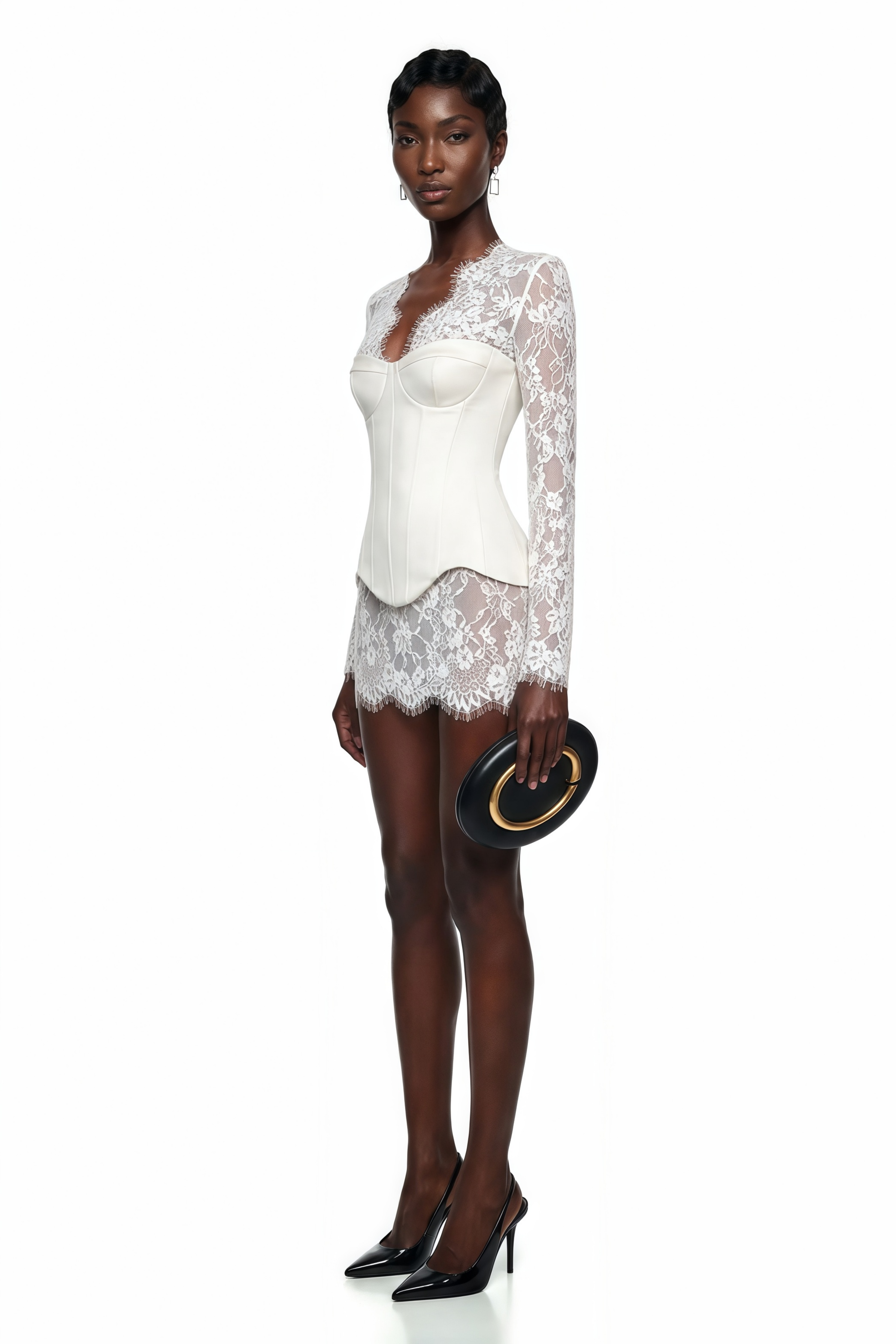 White mini dress featuring a long-sleeve sheer floral lace overlay and a structured corset bodice with an asymmetric hem