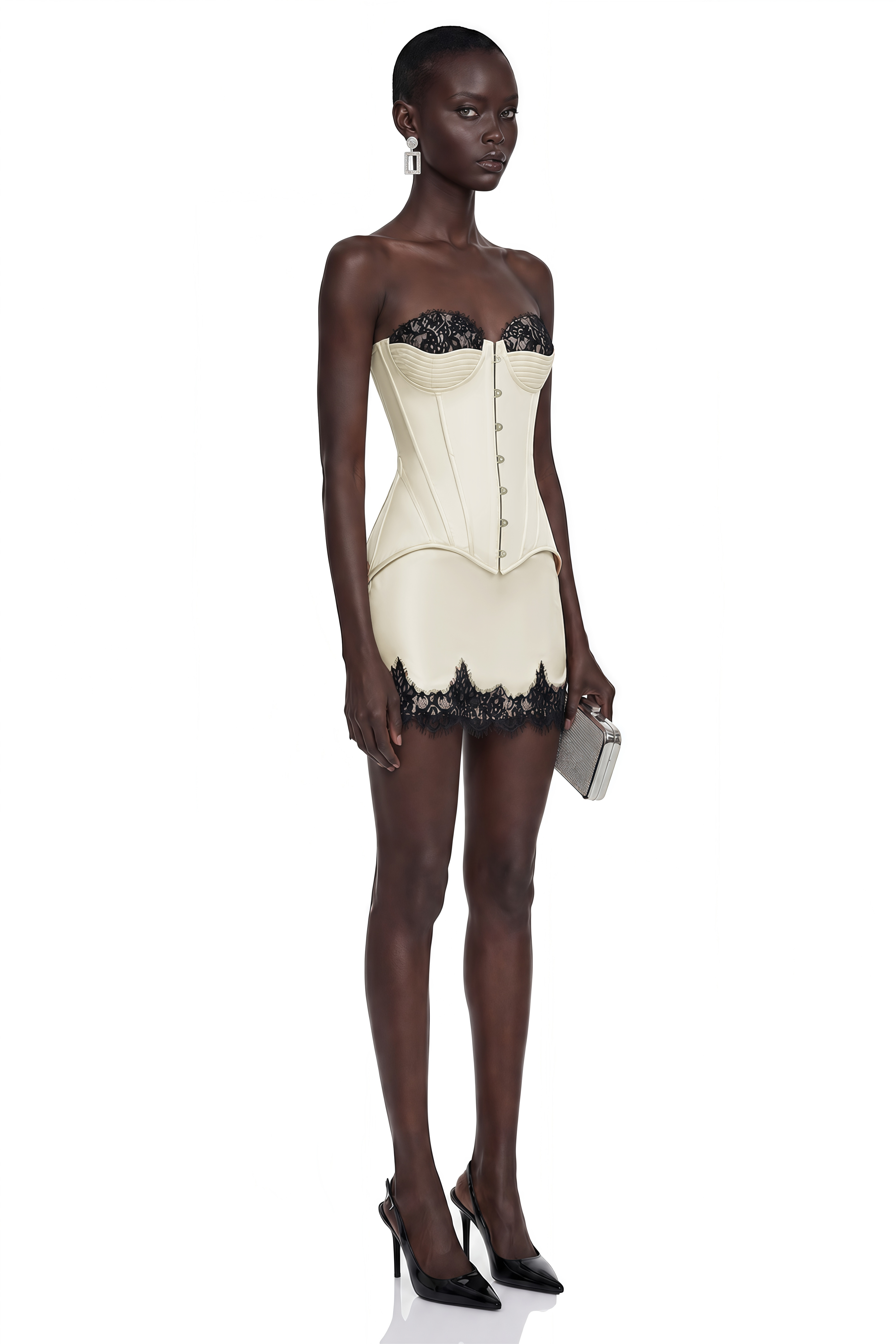 Cream strapless mini dress with a peplum corset and black lace trim