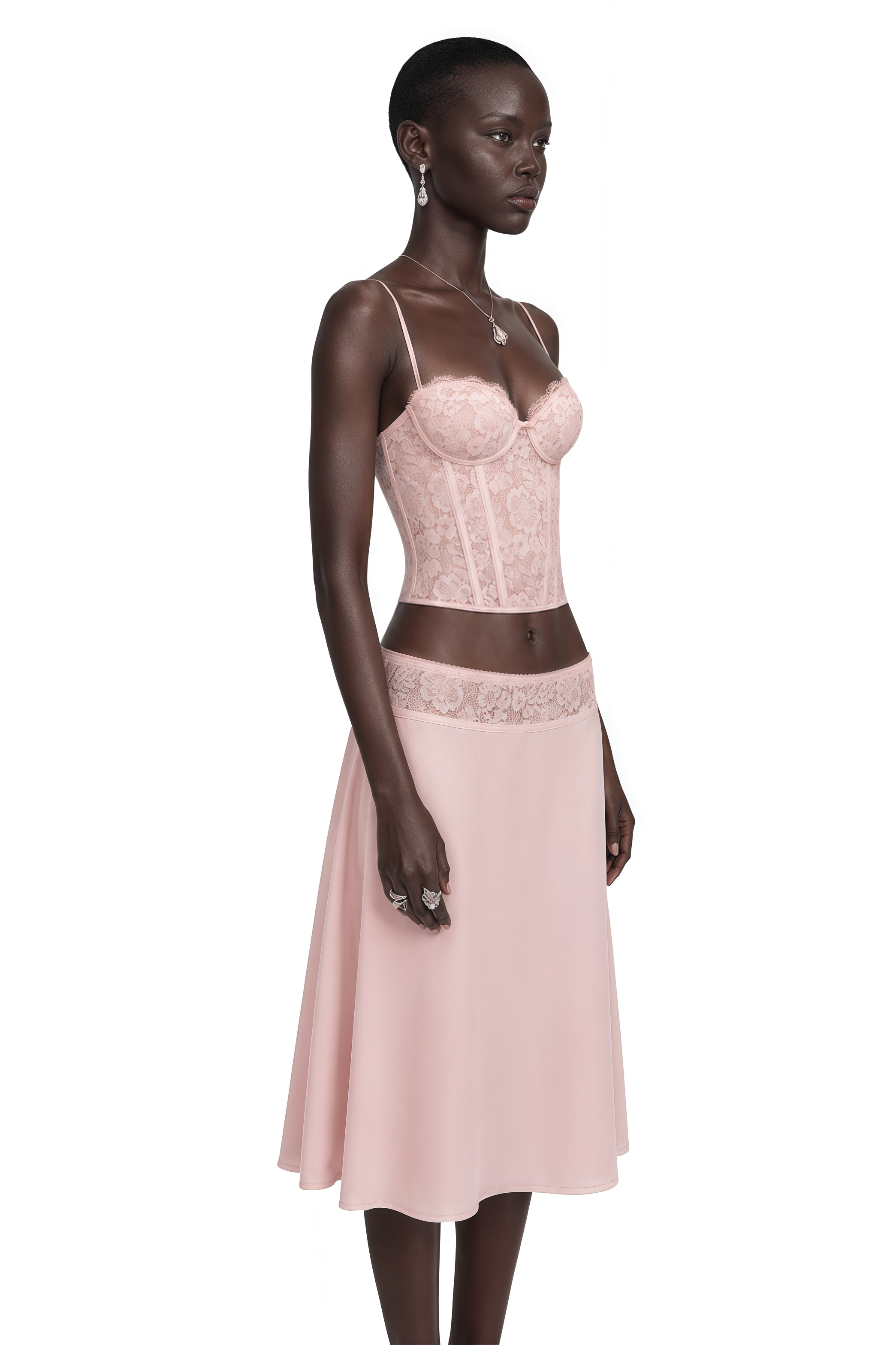 Pink lace corset top paired with an A-line midi skirt
