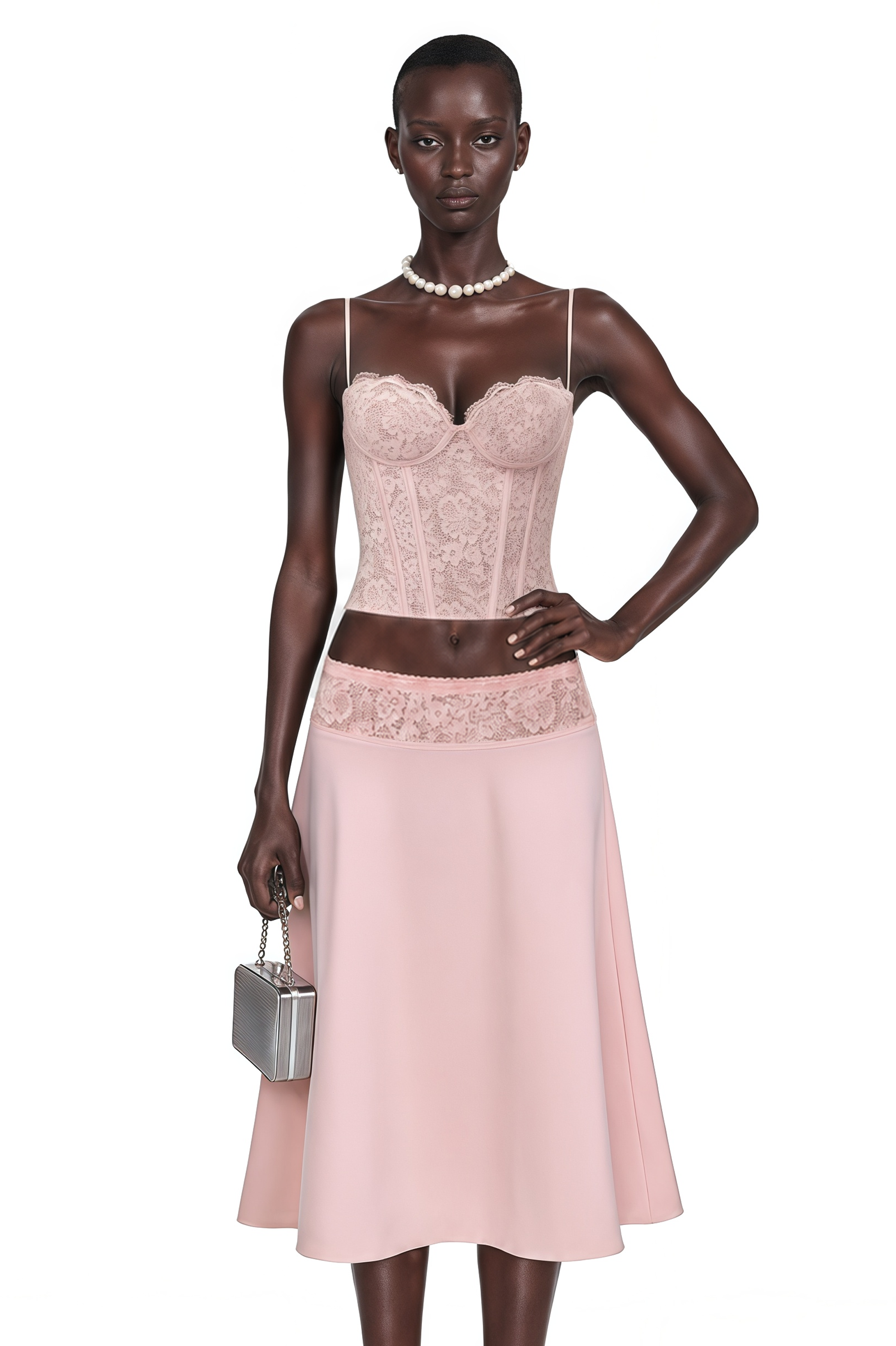 Pink lace corset top paired with an A-line midi skirt