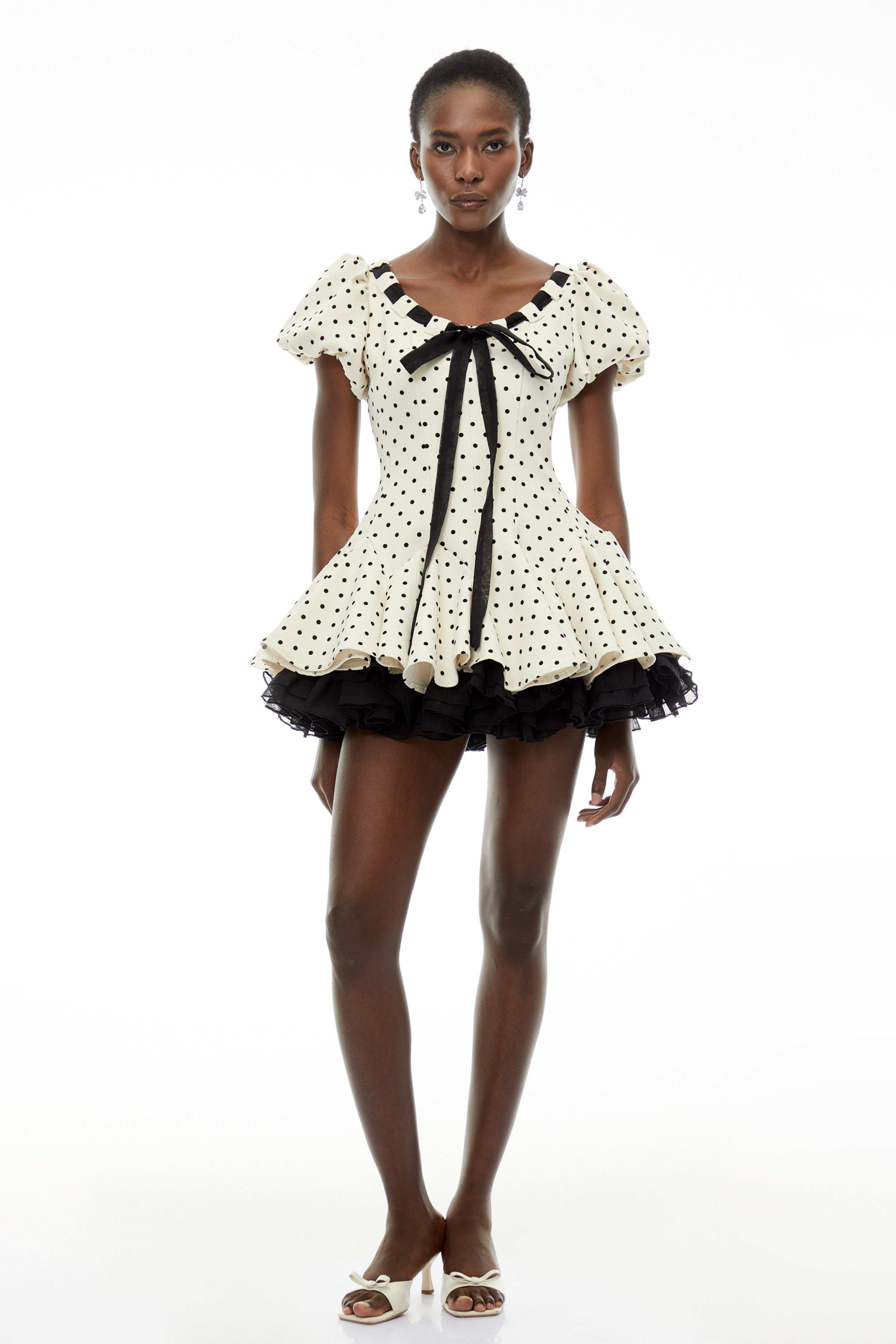 Mini-robe Wania blanche à pois avec nœud sur le devant