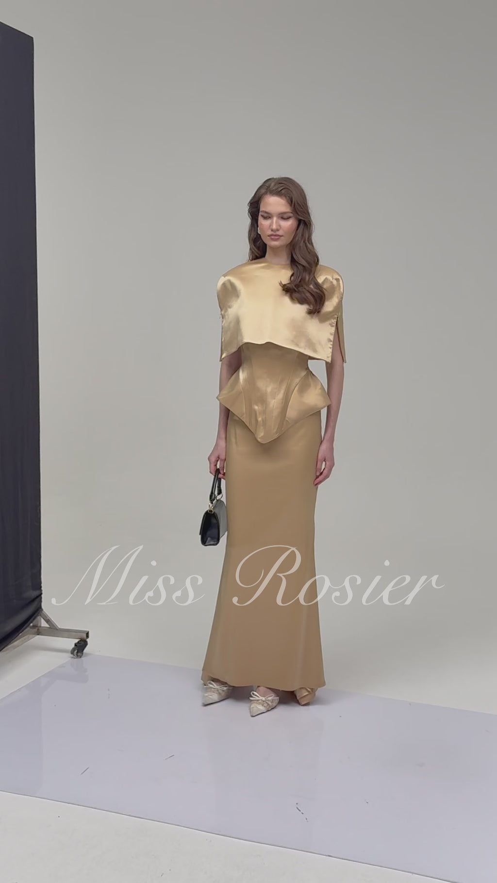 Beige structured gown with a matching bolero and a mermaid skirt