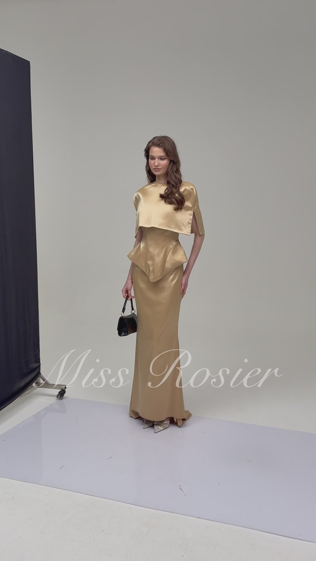 Beige structured gown with a matching bolero and a mermaid skirt