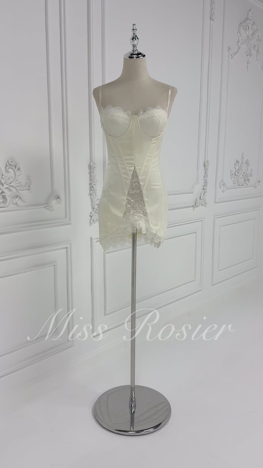 White satin corset mini dress with lace inserts and trim